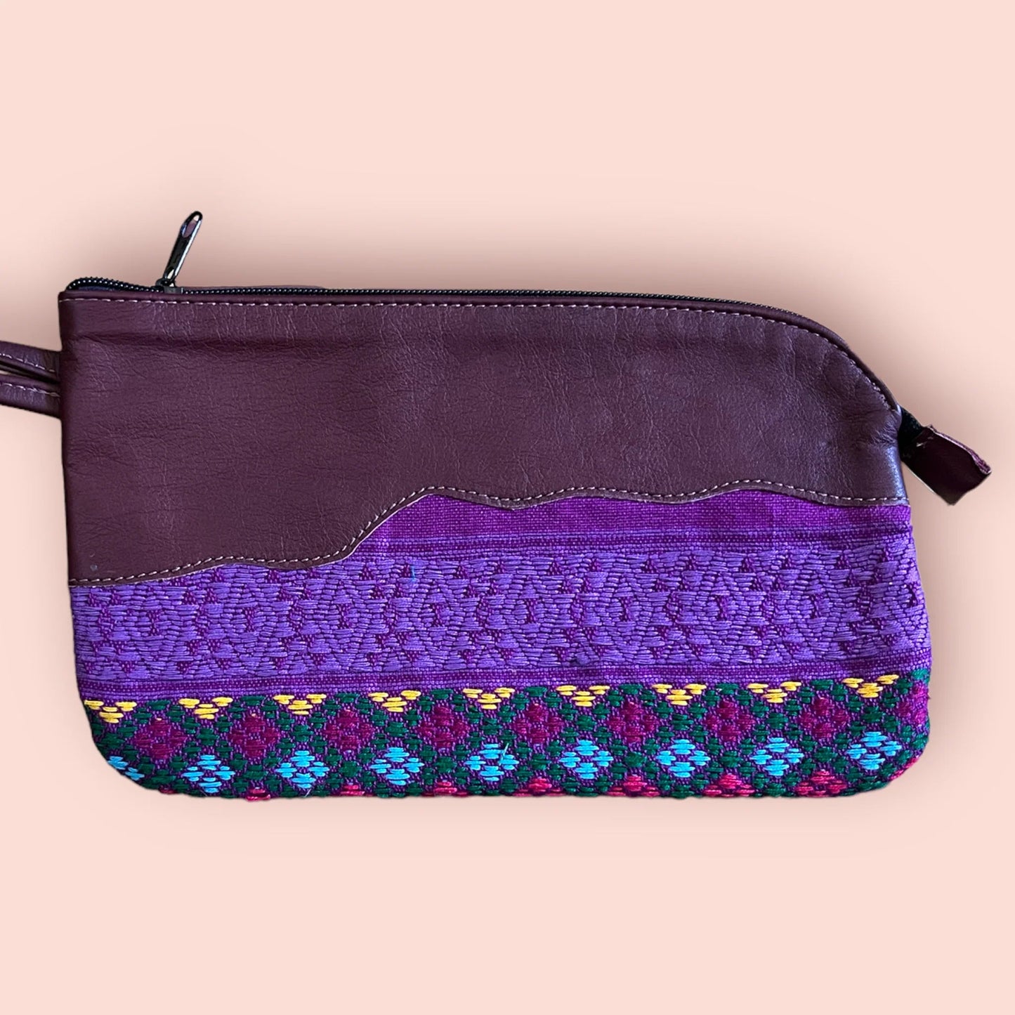 Upcycled Asymmetric leather clutch collection